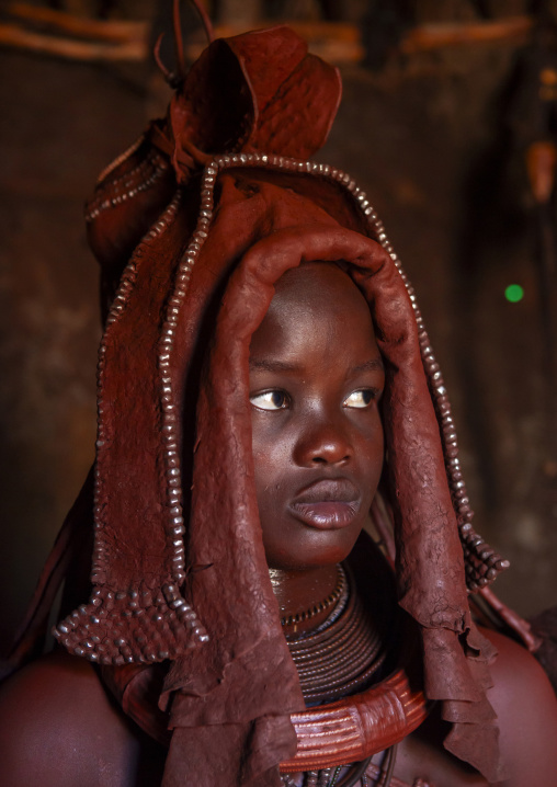 Woman wearing wedding headdress in Himba tribe, Kunene region, Epupa, Namibia
