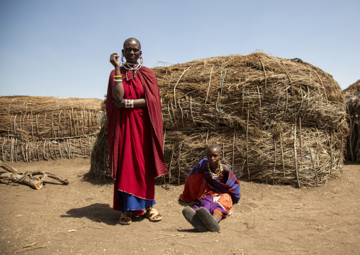 Tanzania, Ashura region, Ngorongoro, Maasai women outside their home