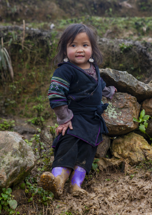 Cute young black Hmong girl in traditional clothes, Lao Cai province, Sapa, Vietnam