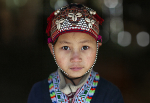 Young red dzao girl with a traditional hat, Lao Cai province, Sapa, Vietnam