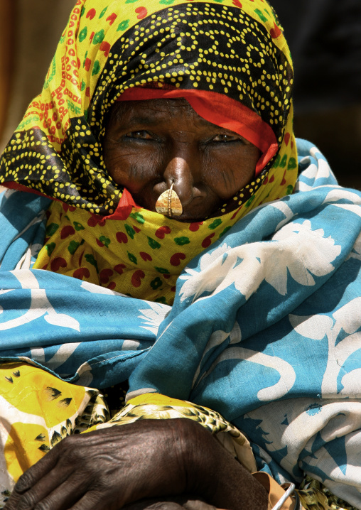 Eritrean woman with nose ring in colorful clothes, Debub, Senafe, Eritrea
