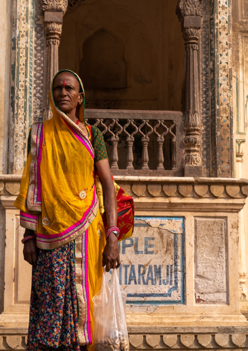 Rajasthani woman in Galtaji temple aka monkey temple, Rajasthan, Jaipur, India