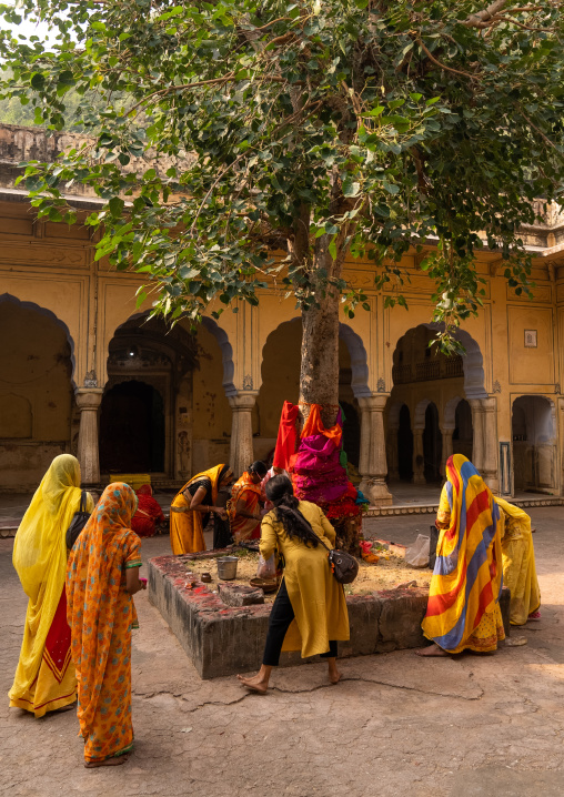 Indian pilgrims making offerings in Galtaji temple, Rajasthan, Jaipur, India