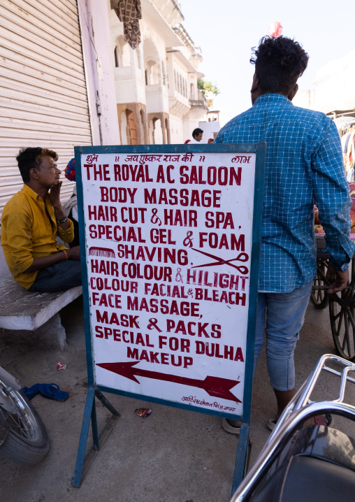 Barber shop and spa sign in the street, Rajasthan, Pushkar, India