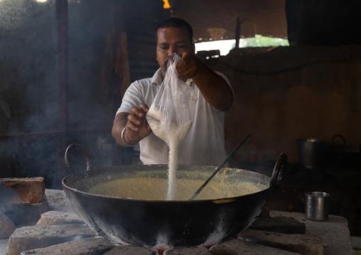 Indian man making sweets, Rajasthan, Bissau, India