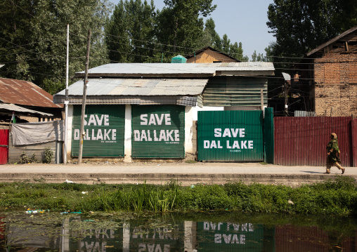 Save Dal Lake billboard on houses for lake conservation, Jammu and Kashmir, Srinagar, India