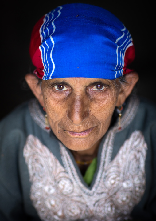 Portrait of an old Gujjar Bakerwal veiled woman, Jammu and Kashmir, Yusmarg, India