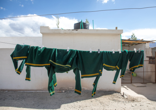 Clothes drying in a courtyard in Tibetan SOS children village, Ladakh, Leh, India