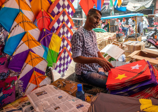Indian seller in a kite shop in old Delhi, Delhi, New Delhi, India