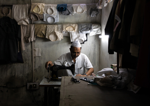 Tailor working in his shop in old Delhi, Delhi, New Delhi, India