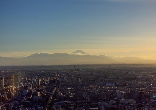 Aerial view of the city and mount Fuji at sunset, Kanto region, Tokyo, Japan