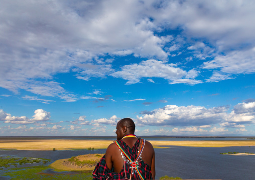 Maasai man looking the landscape, Kajiado County, Amboseli, Kenya