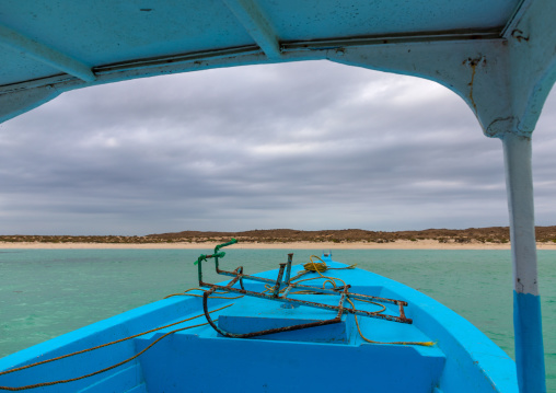 Boat approaching an empty beach, Jazan Province, Farasan, Saudi Arabia