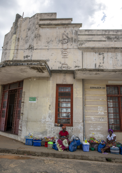 Women selling food in front of an old portuguese building, Inhambane Province, Inhambane, Mozambique