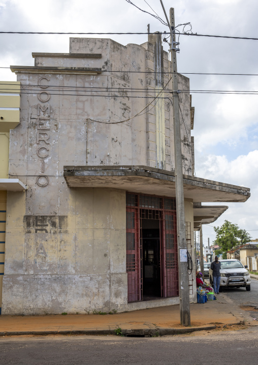 Women selling food in front of an old portuguese building, Inhambane Province, Inhambane, Mozambique