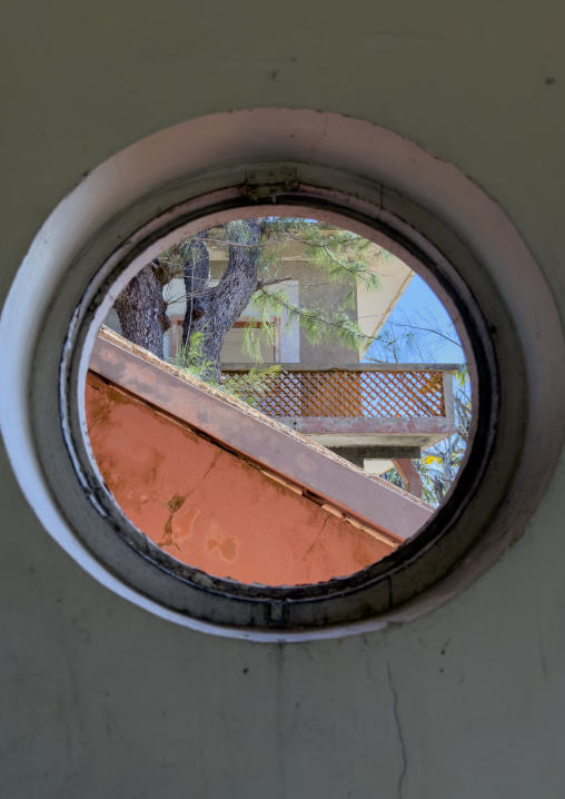 Abandoned Grand Hotel circular window, Bazaruto archipelago, Santa Carolina island, Mozambique