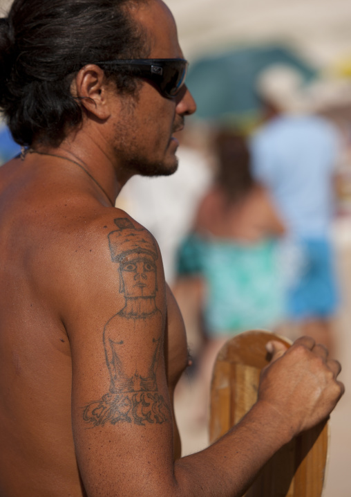 Tattooed man ready for canoe competition at anakena beach, Easter Island, Hanga Roa, Chile