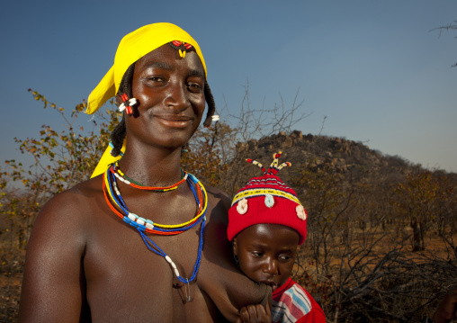 Ceciliai, A Mudimba Woman Breast Feeding Her Child, Village Of Combelo, Angola