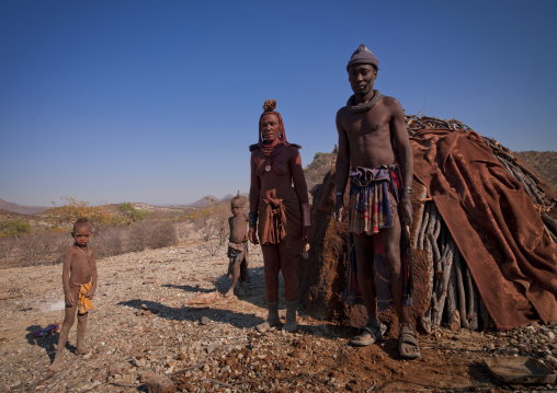 Himba Family In Front Of Their Hut, Angola