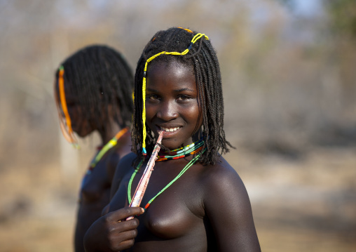 Mudimba Teenage Girl Nibbling A Piece Of Cloth, Village Of Combelo, Angola