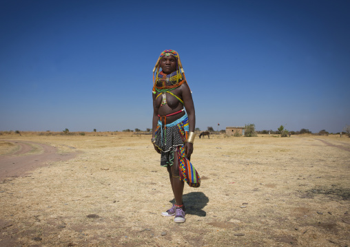 Mumuhuila Woman In Traditional Clothes Wearing Sneakers, Hale Village, Angola