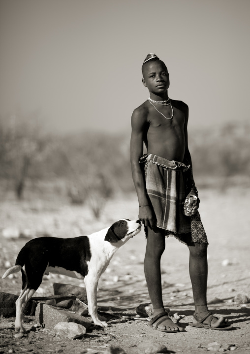 Muhimba Boy With A Dog Smelling His Hand, Angola