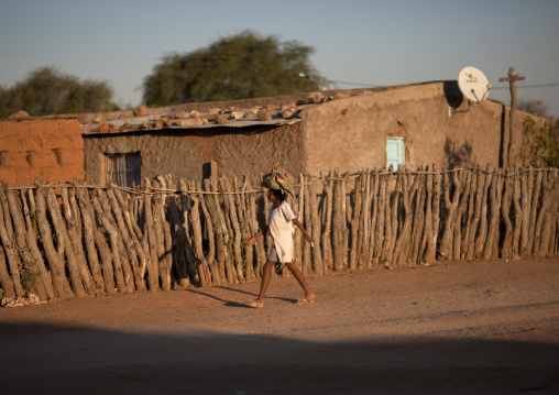 Mucawana Carrying A Bundle On Her Head, Village Of Oncocua, Angola