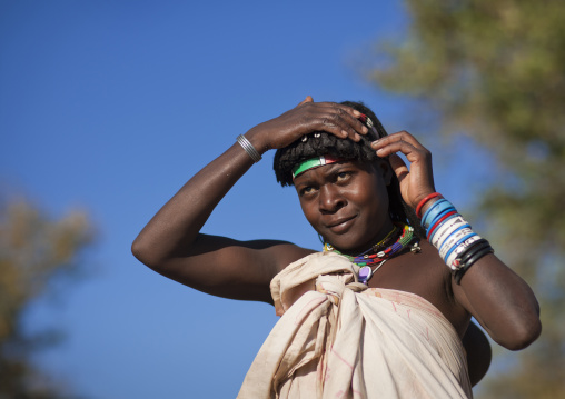 Mucawana Woman Combing Her Hair, Village Of Oncocua, Angola