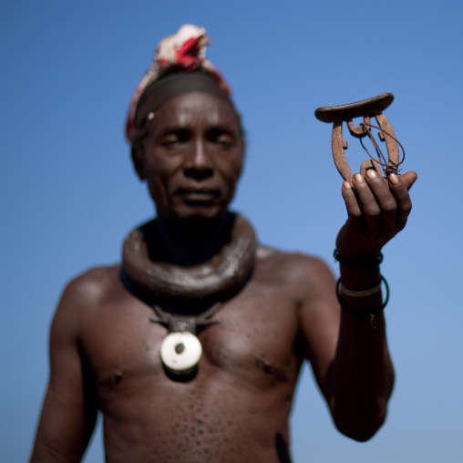 Old Muhimba Man Showing His Headrest, Village Of Elola, Angola