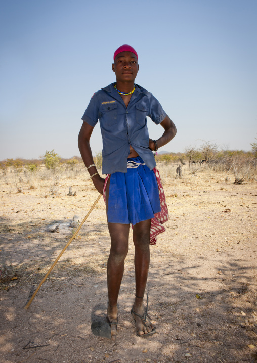 Himba Young Man Wearing A Shirt Of The American Scouts, Angola