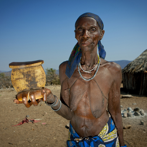 Old Mucawana Woman Called Miss Cammandante Holding A Headrest, Village Of Soba, Angola
