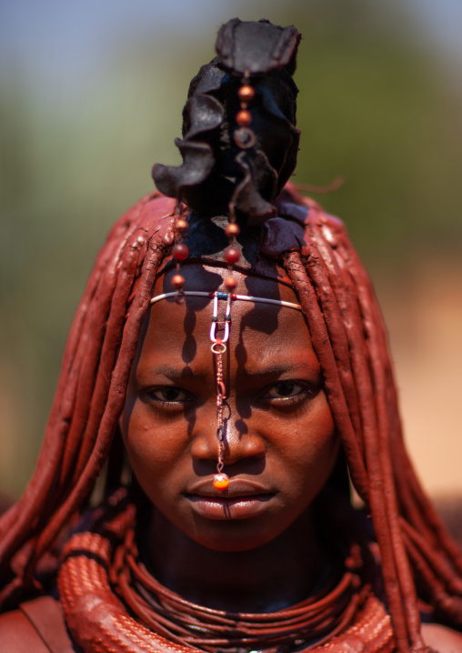 Portrait of a Himba tribe woman covered with otjize, Cunene Province, Oncocua, Angola