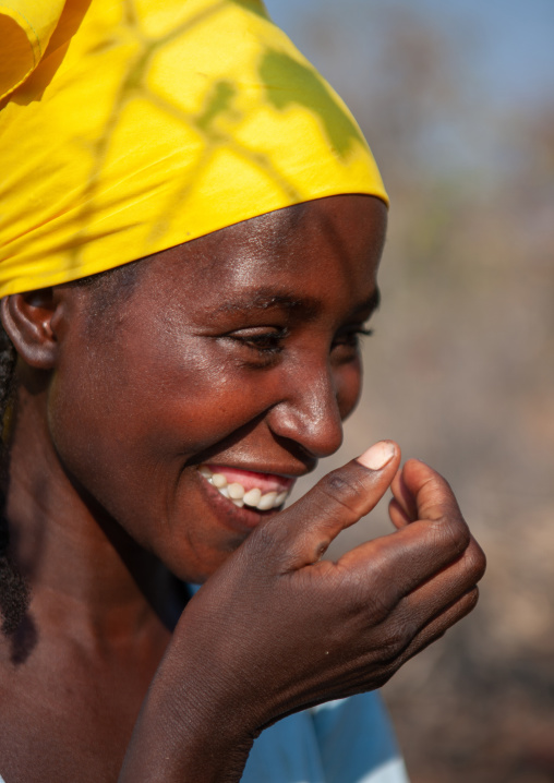 Portrait of a laughing Mudimba  tribe woman laughing, Cunene Province, Cahama, Angola