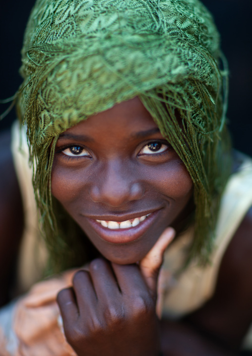 Portrait of a smiling Mudimba  tribe girl, Cunene Province, Cahama, Angola