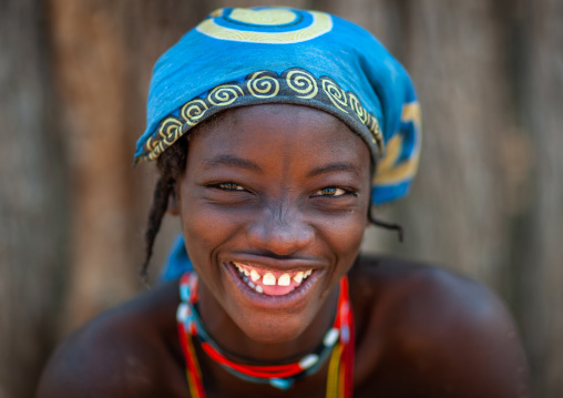 Portrait of a smiling Muhacaona  tribe woman, Cunene Province, Oncocua, Angola