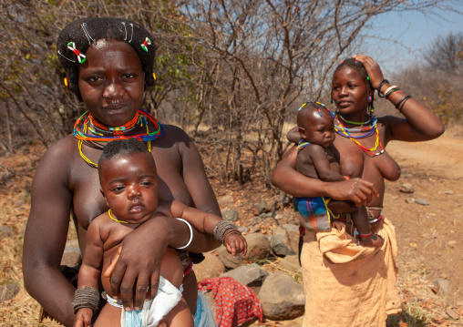 Mudimba tribe women with their children, Cunene Province, Kuroca, Angola