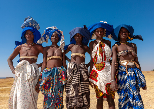 Mucubal tribe women wearing blue headwears, Namibe Province, Virei, Angola