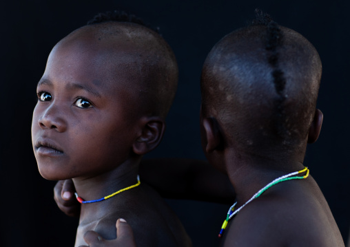 Portrait of Muhacaona tribe children, Cunene Province, Oncocua, Angola