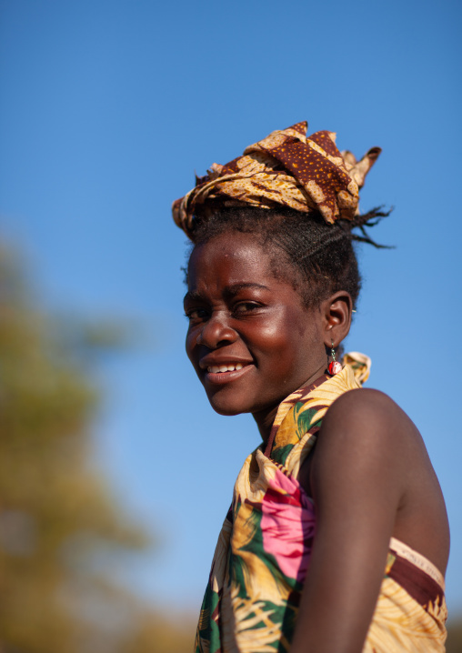 Portrait of a smiling Muhacaona  tribe girl, Cunene Province, Oncocua, Angola