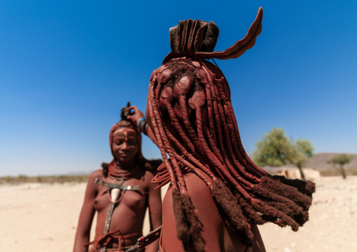 Himba tribe women covered with otjize, Cunene Province, Oncocua, Angola