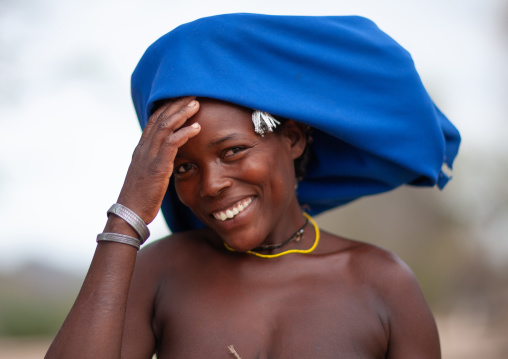 Mucubal tribe woman wearing a blue headwear, Namibe Province, Virei, Angola