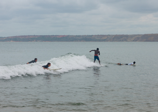 People surfing at Capo Ledo, Luanda Province, Capo Ledo, Angola