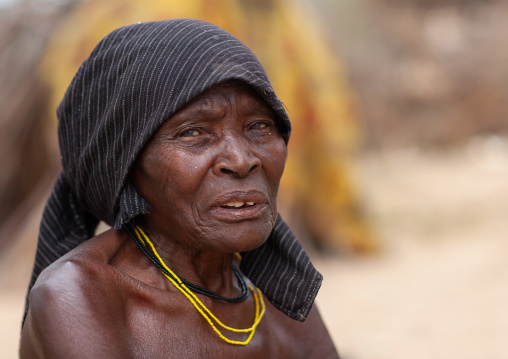 Portrait of a senior Mucubal tribe woman, Namibe Province, Virei, Angola