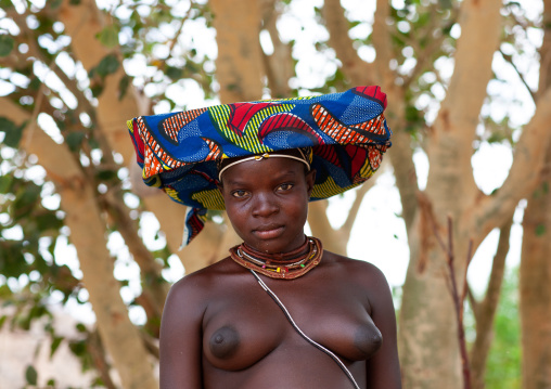Mucubal tribe woman wearing a colorful headwear, Namibe Province, Virei, Angola
