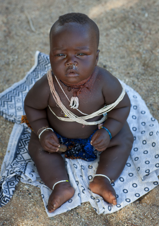Mucubal Baby On The Floor, Virie Area, Angola