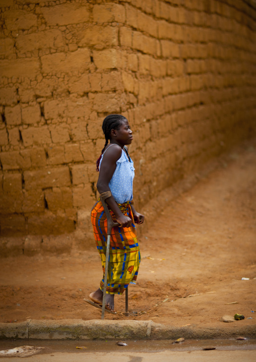 Girl On Crutches In The Streets Of Huambo, Angola