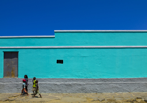 Kids Passing By An Old Colonial Building, Namibe Town, Angola