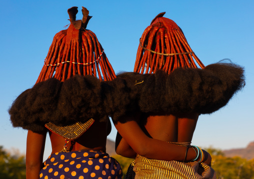Married himba tribe women rear view, Cunene Province, Oncocua, Angola