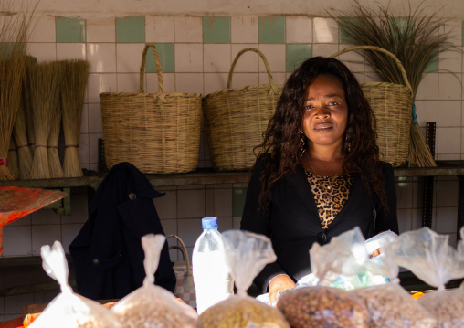 Angolan woman selling baskets in the market, Huila Province, Lubango, Angola