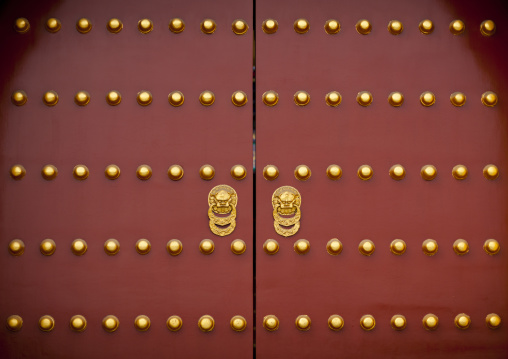 Painted Door With Brass Studs And Door Knocker In Temple Of Heaven, Beijing, China